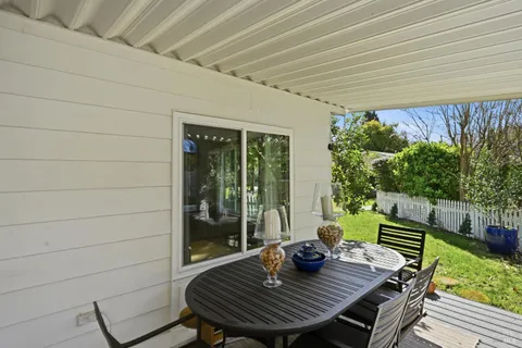 a view of a outdoor seating area with furniture