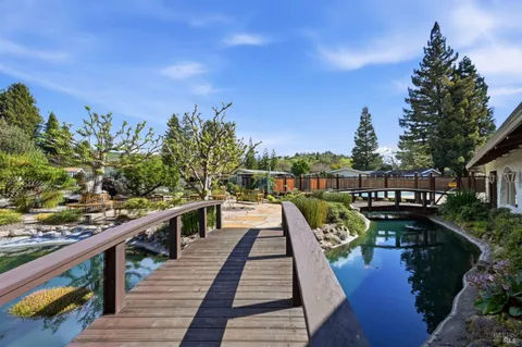 a view of a lake with a garden