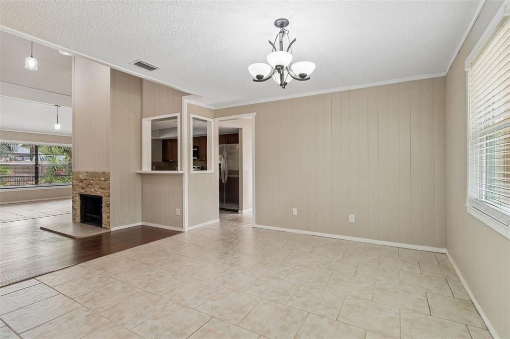 1470 Burnham Lane Dunedin, FL 34698 - Photo 11 of 42 a view of a livingroom with a kitchen