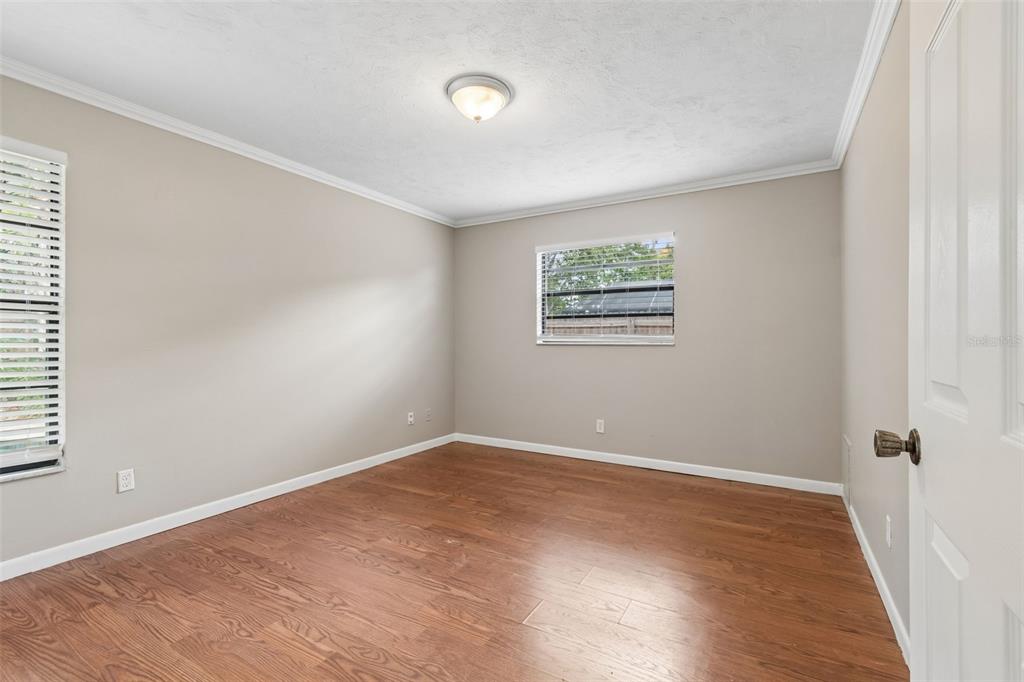 1470 Burnham Lane Dunedin, FL 34698 - Photo 30 of 42 an empty room with a window