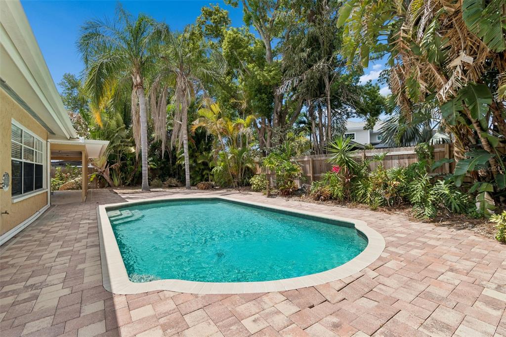 1470 Burnham Lane Dunedin, FL 34698 - Photo 34 of 42 a view of swimming pool having outdoor seating