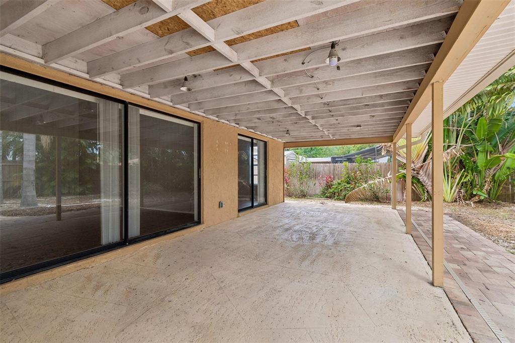 1470 Burnham Lane Dunedin, FL 34698 - Photo 36 of 42 a view of a porch