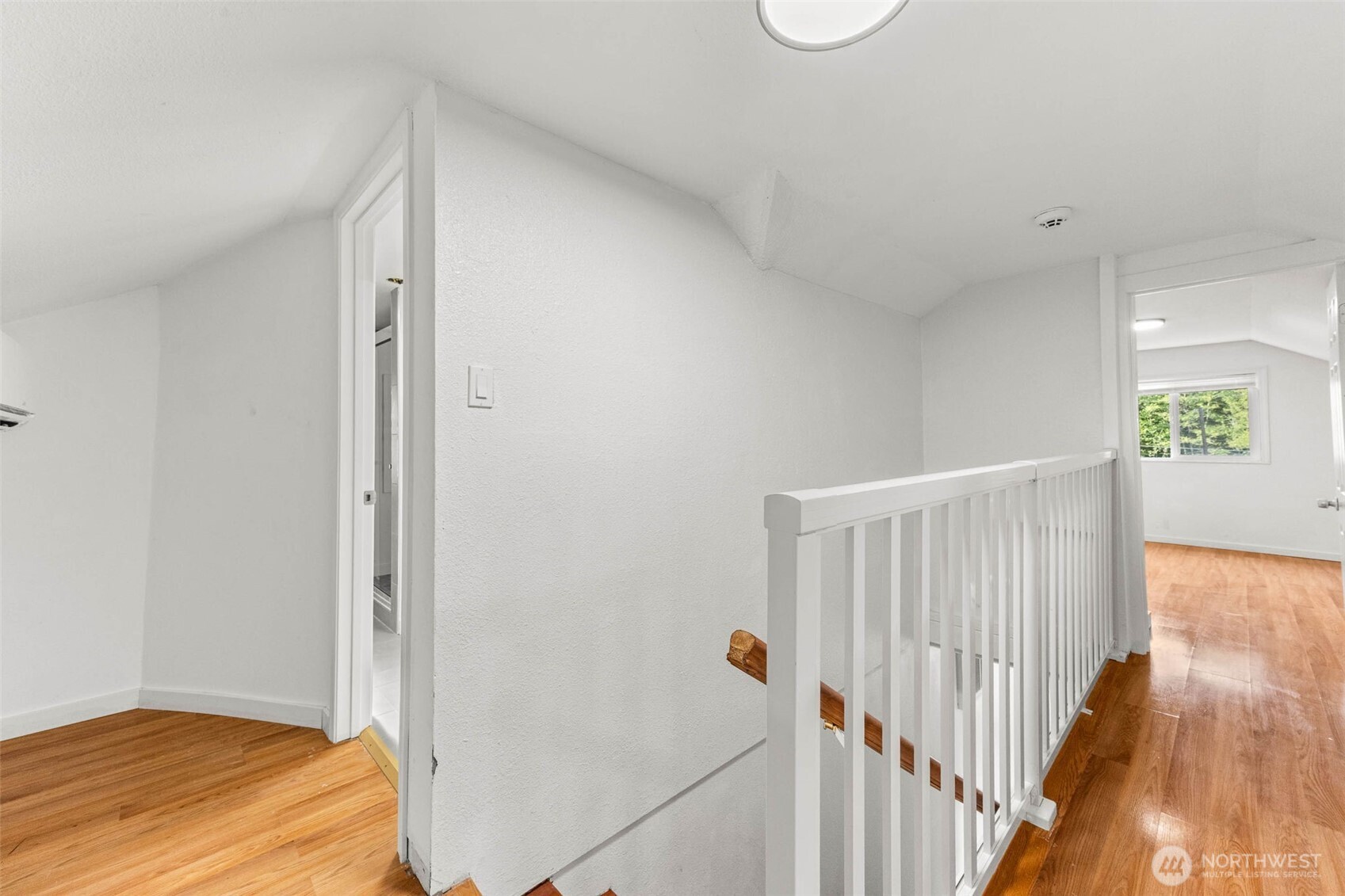 172 South Bank Road Elma, WA 98541 - Photo 26 of 40 a view of hallway with bedroom and wooden floor