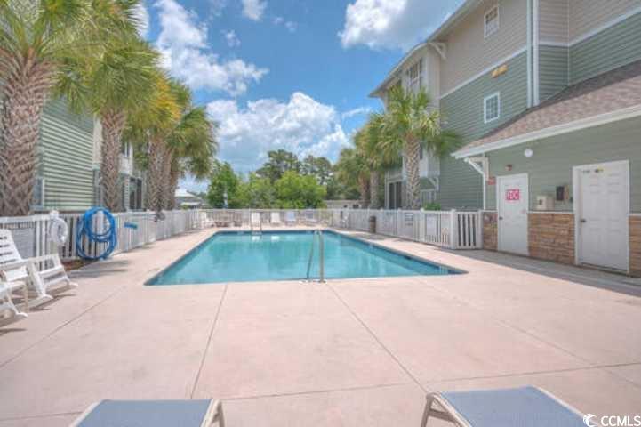 70 Addison Cottage Way, Unit 319 Murrells Inlet, SC 29576 - Photo 30 of 30 Community pool featuring a patio