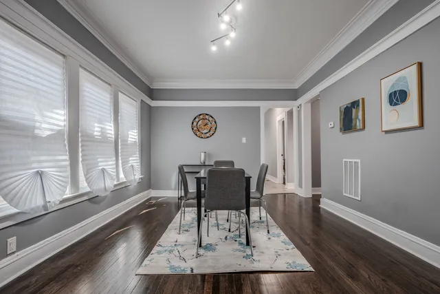a view of a livingroom with furniture and wooden floor