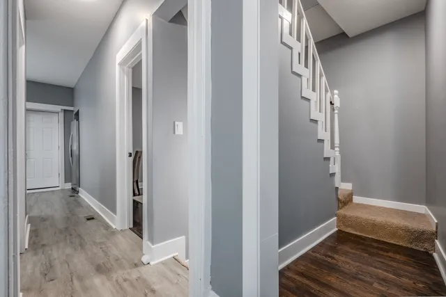a bedroom with a bed and a desk