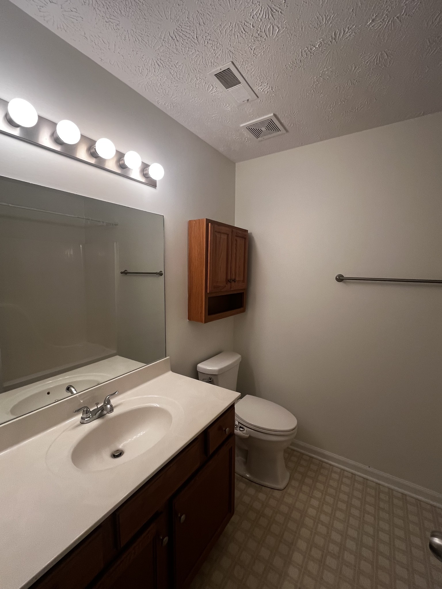 1175 Catawba Way Murfreesboro, TN 37130 - Photo 8 of 11 a bathroom with a sink toilet and mirror