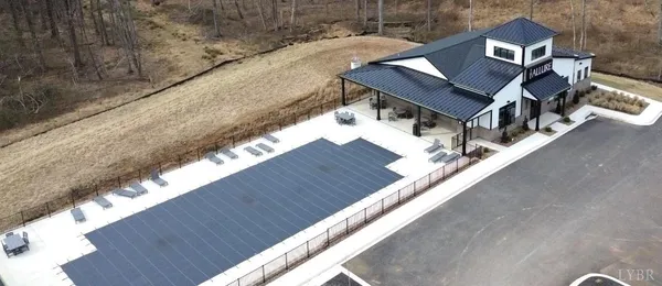 an aerial view of a house with a garden