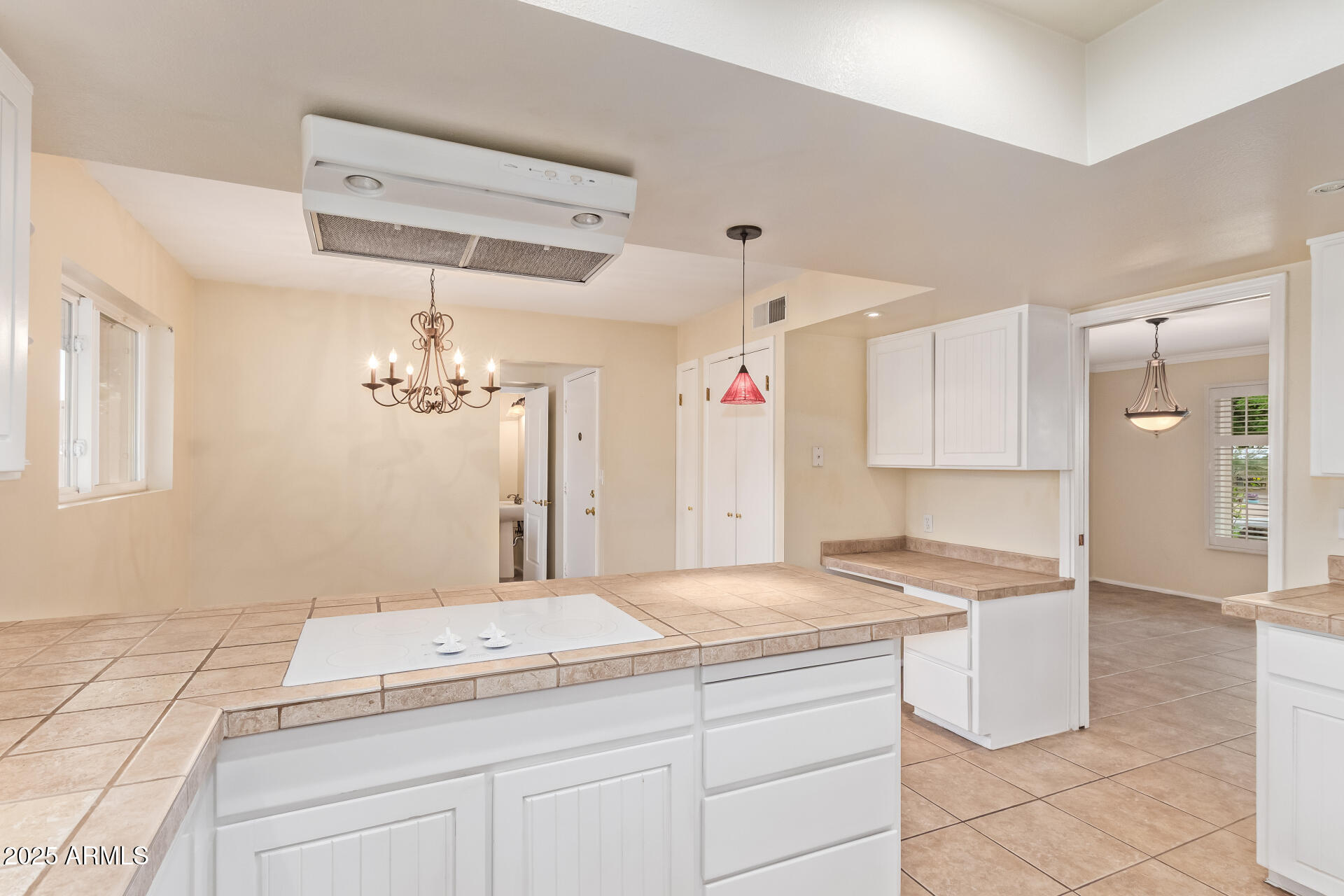 2234 East Lawrence Road Phoenix, AZ 85016 - Photo 16 of 71 a kitchen with a sink cabinets and window