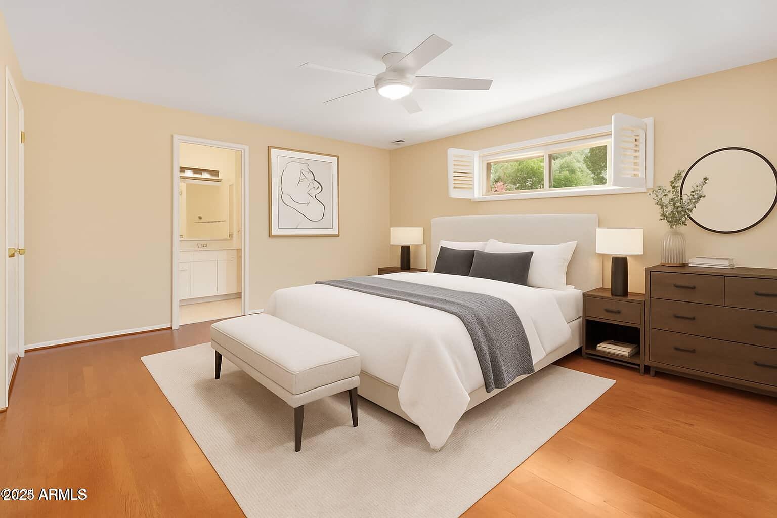 2234 East Lawrence Road Phoenix, AZ 85016 - Photo 21 of 71 a bedroom with a bed and a night stand