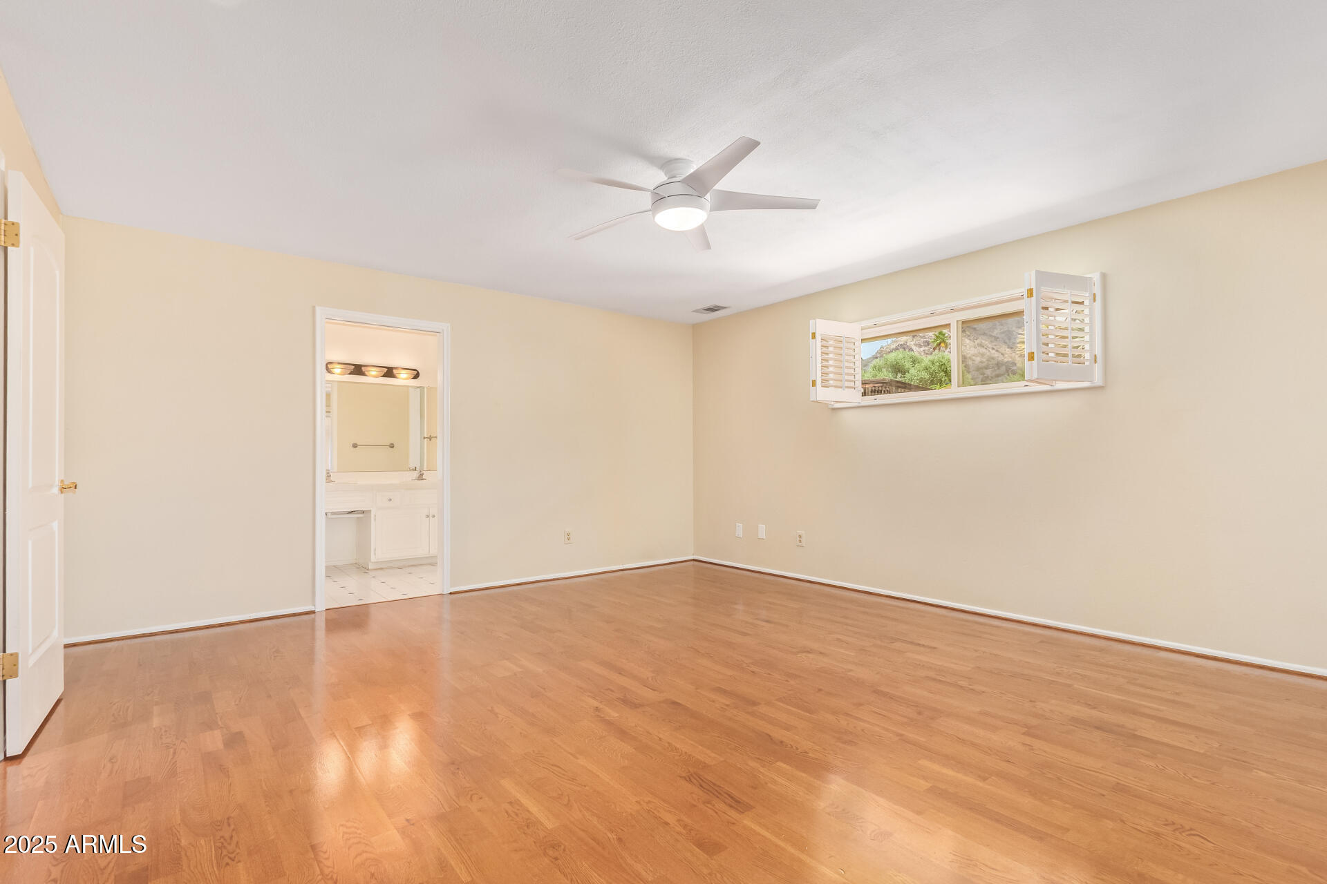 2234 East Lawrence Road Phoenix, AZ 85016 - Photo 22 of 71 wooden floor in an empty room