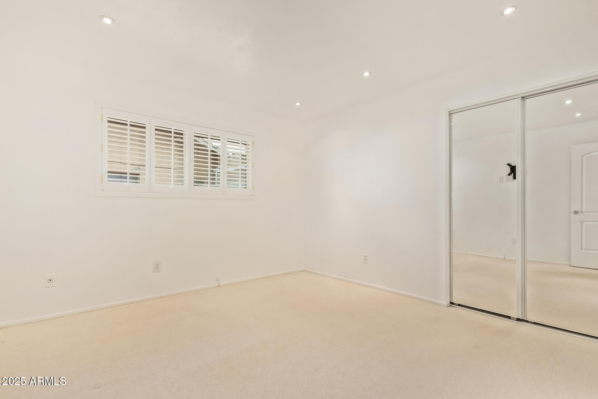 2234 East Lawrence Road Phoenix, AZ 85016 - Photo 29 of 71 a view of an empty room with a window