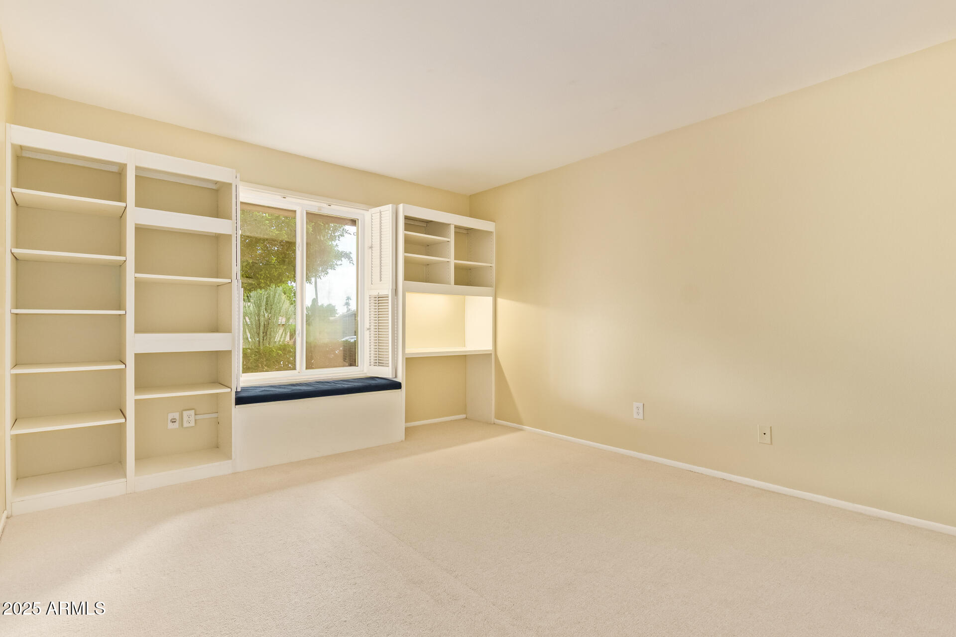 2234 East Lawrence Road Phoenix, AZ 85016 - Photo 33 of 71 a view of an empty room with a window