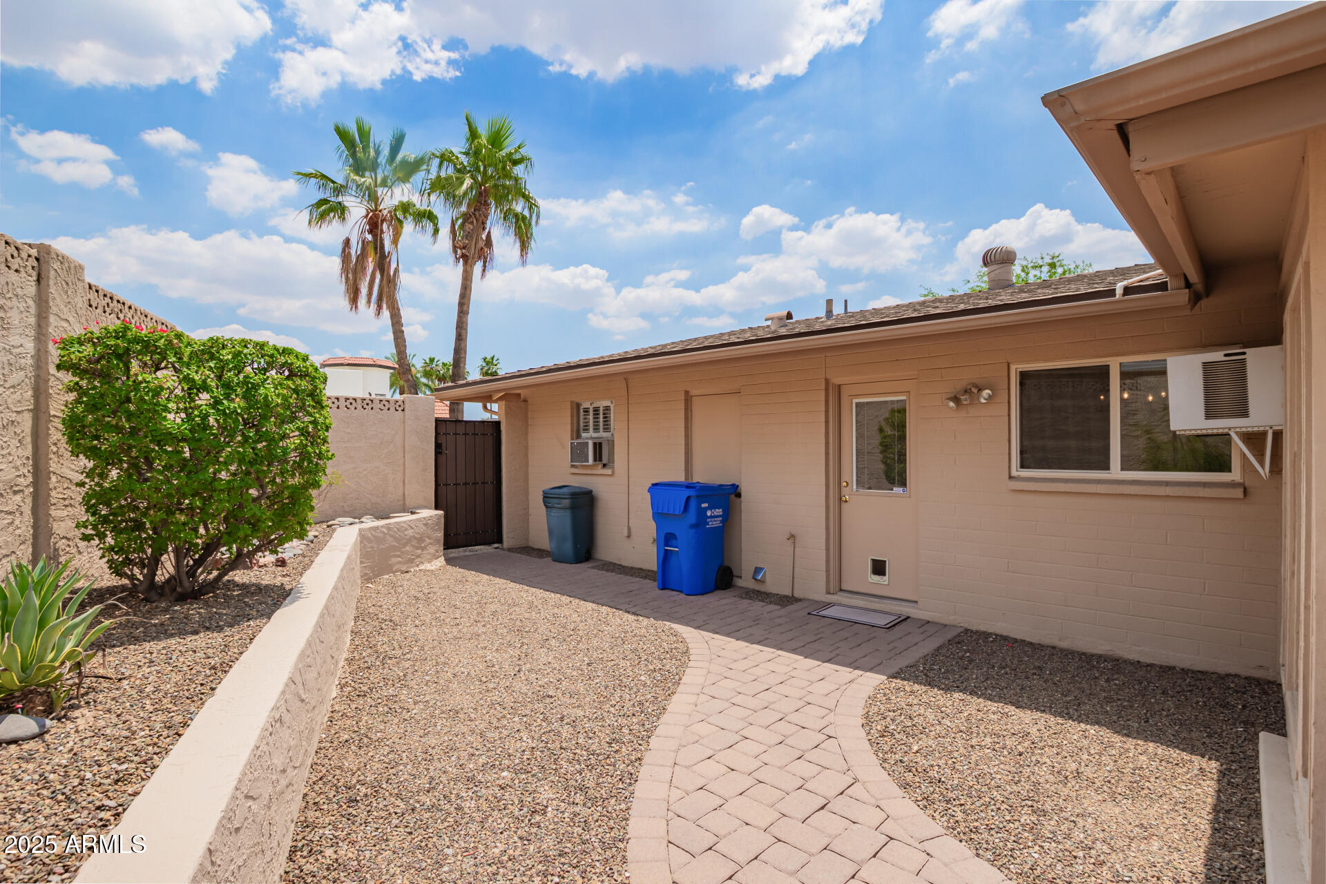 2234 East Lawrence Road Phoenix, AZ 85016 - Photo 46 of 71 a view of a house with potted plants