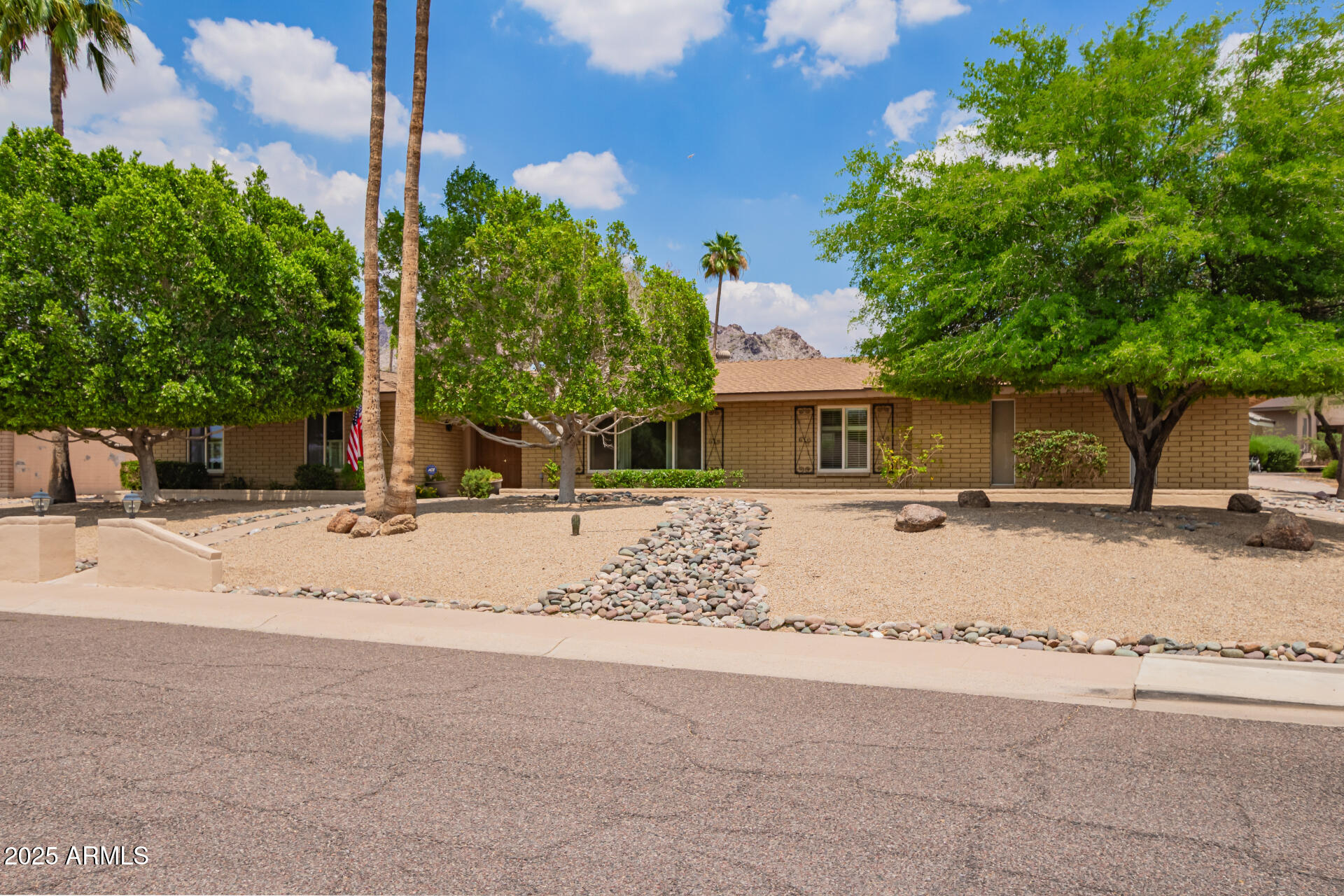 2234 East Lawrence Road Phoenix, AZ 85016 - Photo 57 of 71 a front view of a house with a yard