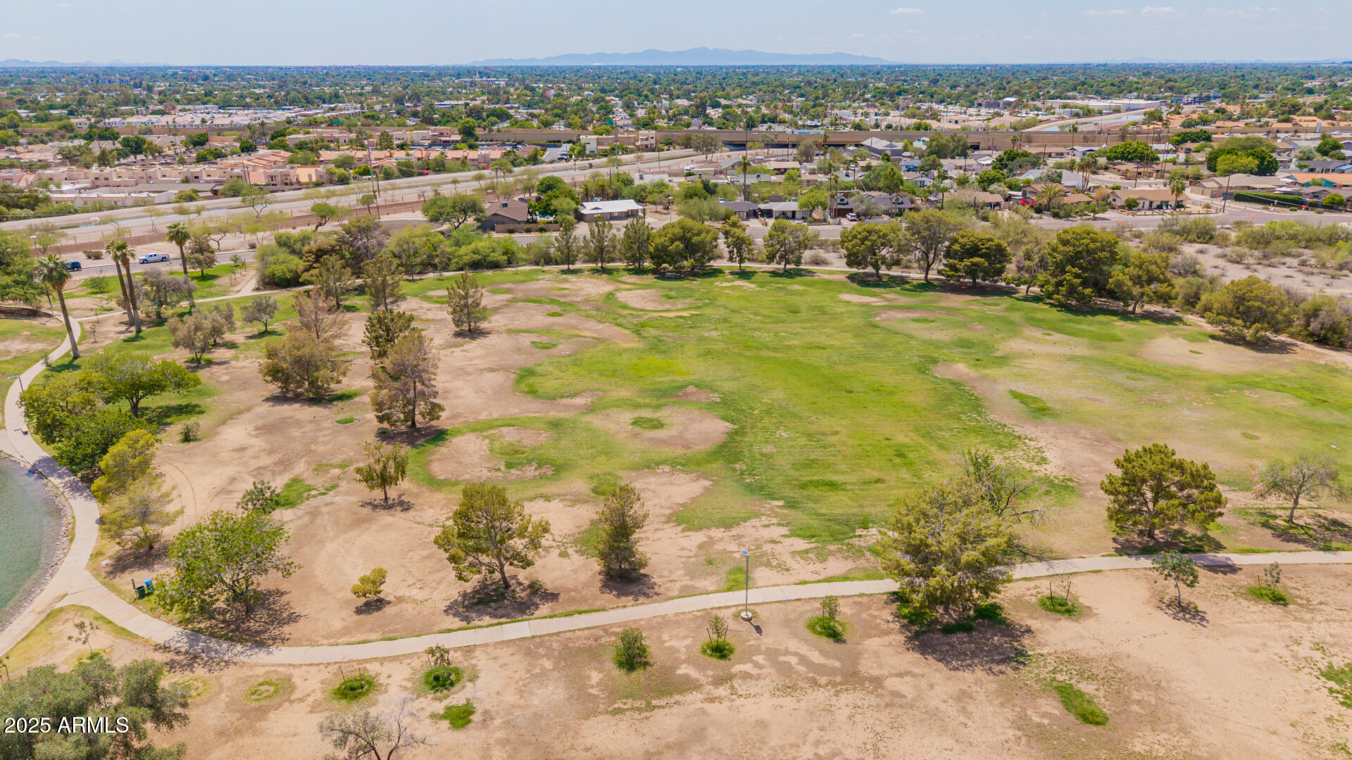 2234 East Lawrence Road Phoenix, AZ 85016 - Photo 66 of 71 an aerial view of residential houses with outdoor space