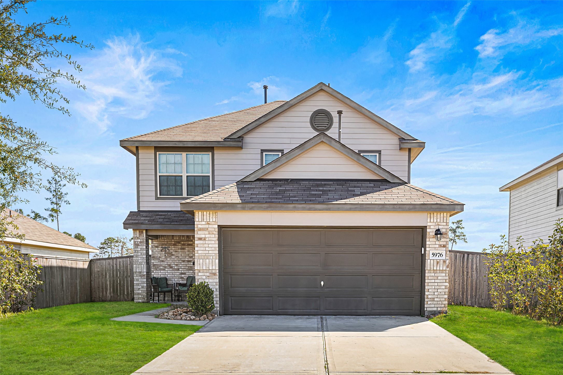 5976 Rimini Landing Lane Porter, TX 77365 - Photo 1 of 18 a house with a outdoor space