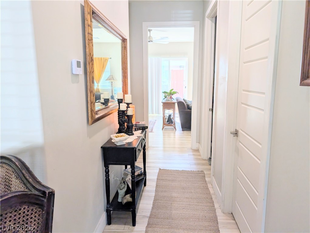 251 Spring Heights Caliente, NV 89008 - Photo 22 of 27 This inviting hallway features sleek flooring, leading to a bright living space.
