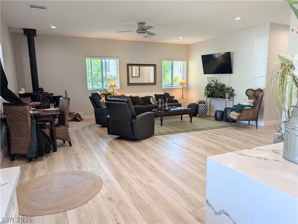 251 Spring Heights Caliente, NV 89008 - Photo 27 of 27 This inviting living area boasts an open floorplan with natural light and a cozy fireplace.