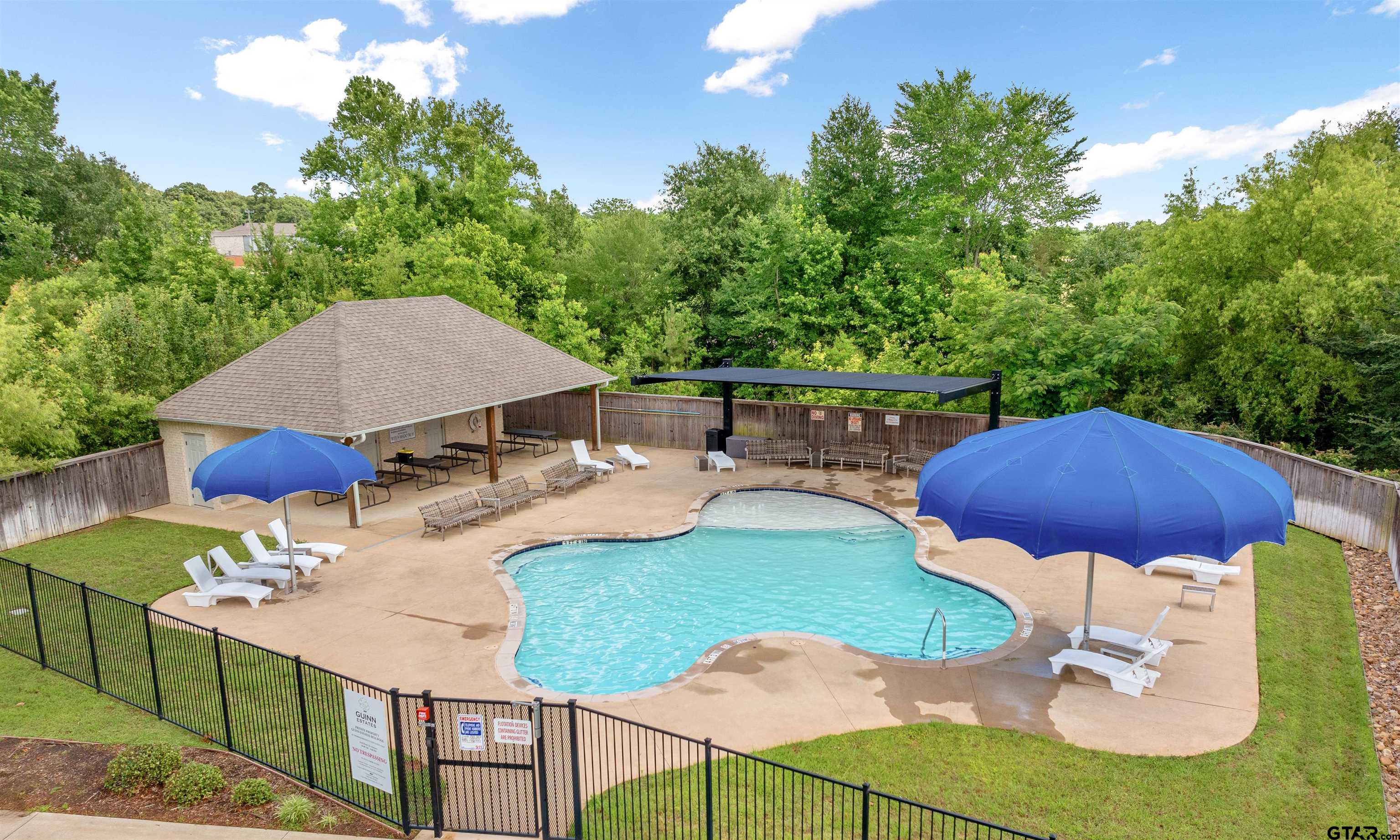 3057 Guinn Farms Road Tyler, TX 75707 - Photo 32 of 32 a view of backyard of house with seating space