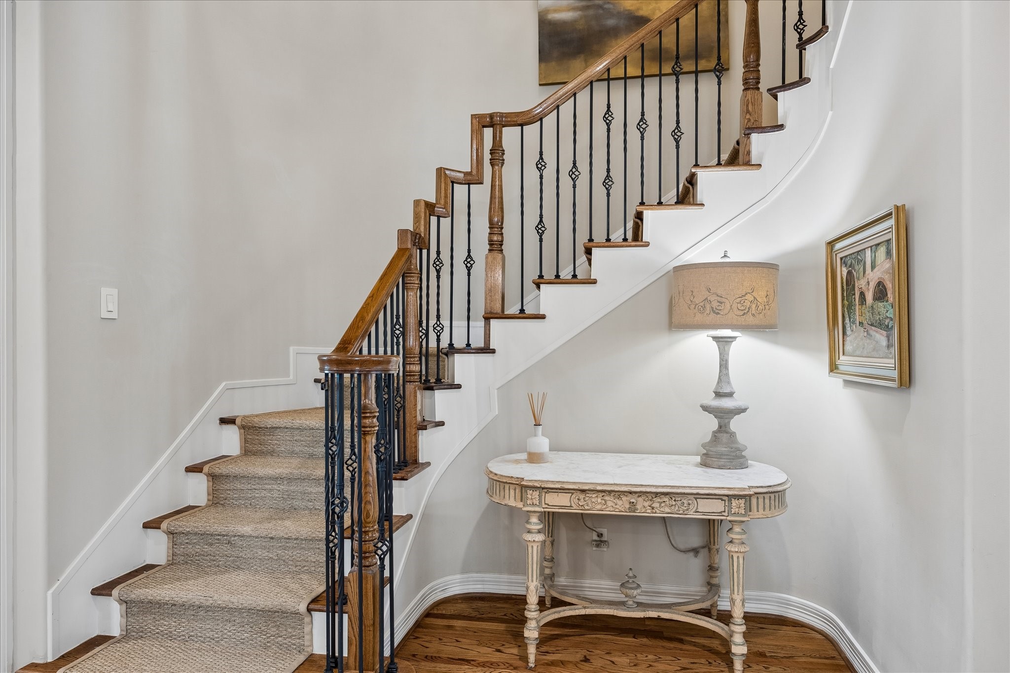 802 Anderson Street Bellaire, TX 77401 - Photo 16 of 36 The spiral staircase is gorgeous and needs to be seen in person to understand its true beauty.