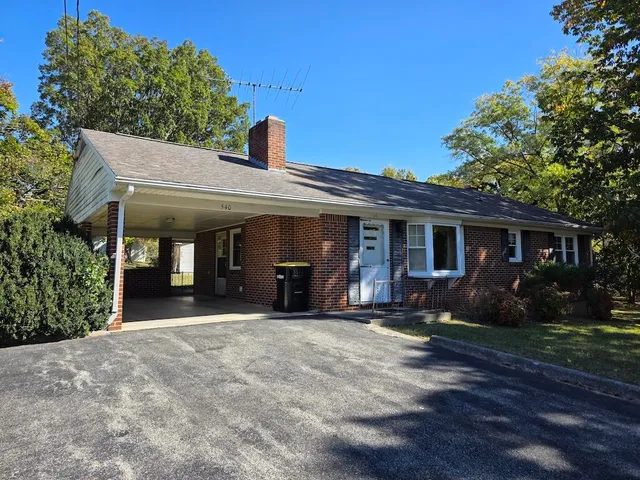 a front view of a house with a patio