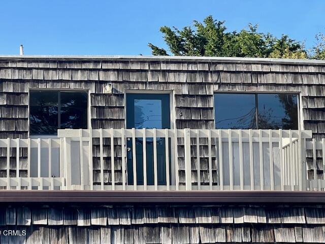 511 Cypress Street, Unit 4 Fort Bragg, CA 95437 - Photo 4 of 38 a view of a wooden balcony