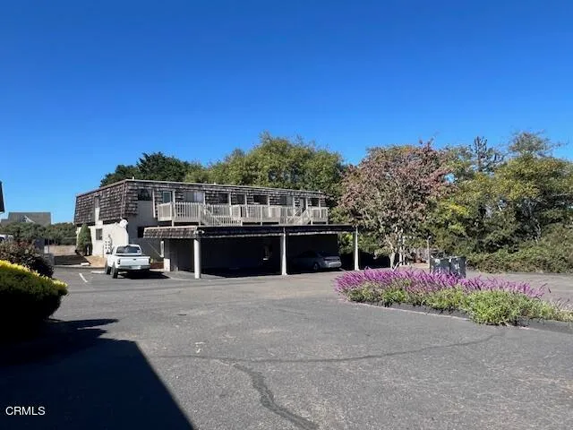 a view of a parking space and a street view