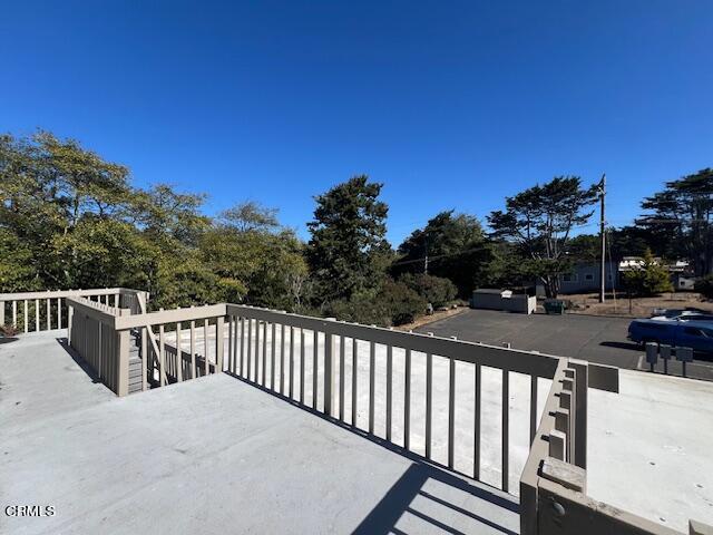 511 Cypress Street, Unit 4 Fort Bragg, CA 95437 - Photo 9 of 38 a view of a deck with sunset view