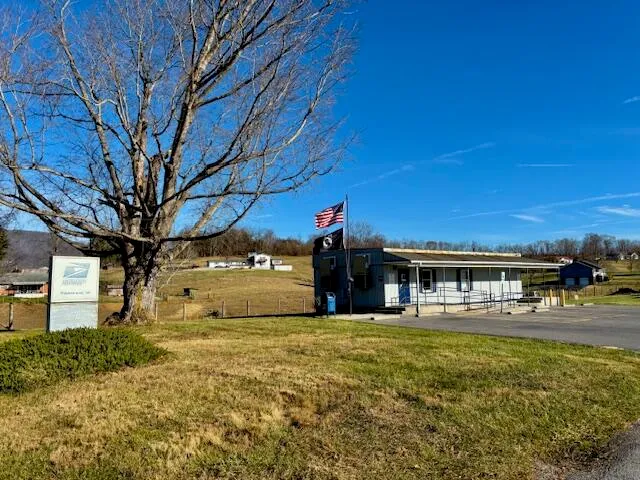 a view of a house with a big yard