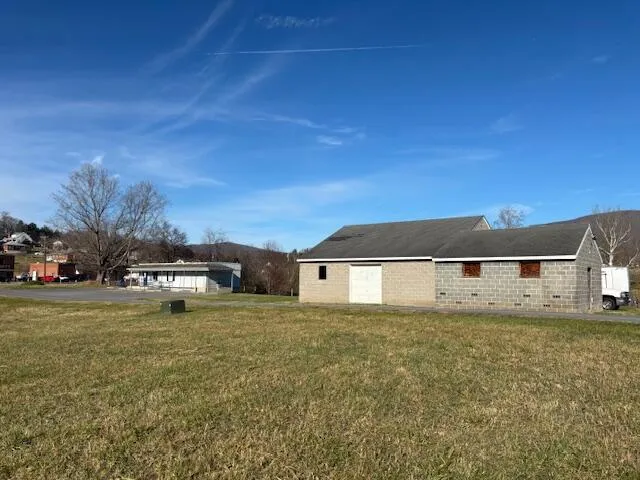 a view of a house with a big yard