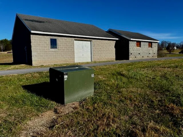 a front view of a house with backyard