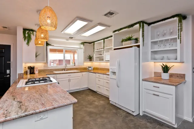 a bathroom with a tub and a shower