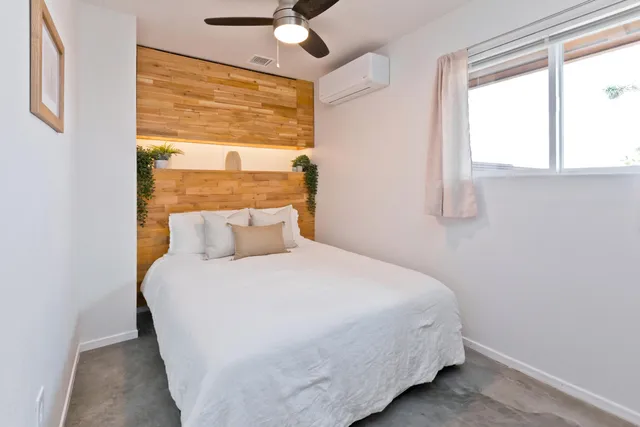 a view of a building with sitting area