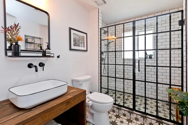 a front view of a house with a sitting area