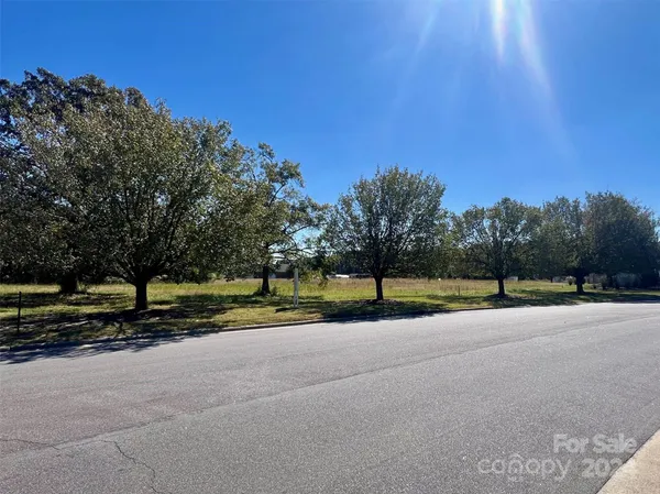 a view of road with trees
