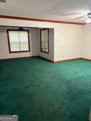 a view of a room that has a window in it
