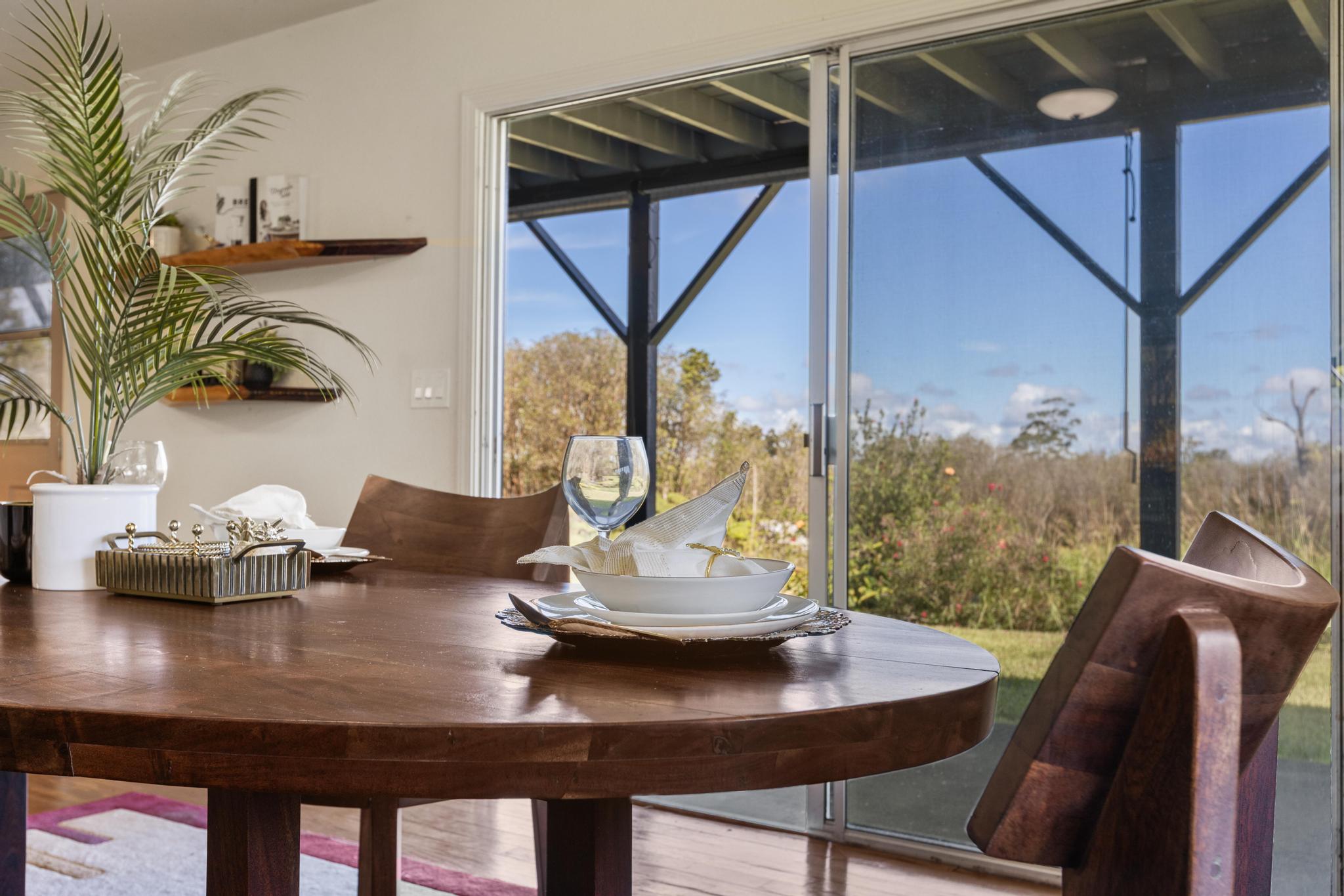 18-4565 Makaala Rd Mountain View Mountain View, HI 96771 - Photo 5 of 25 a view of a dining room with furniture window and outside view