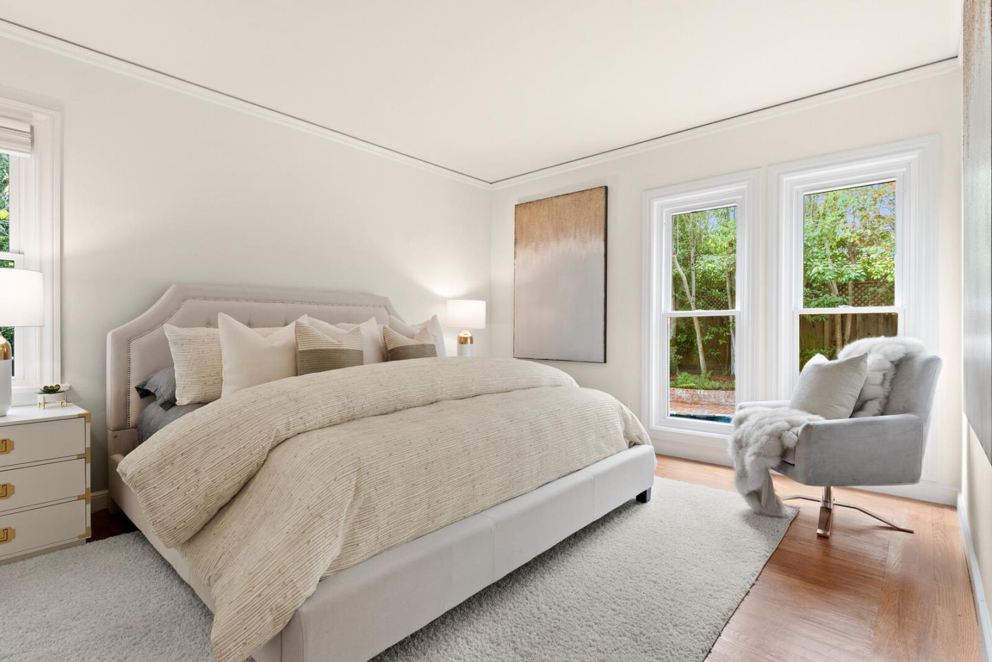 750 Edgewood Road San Mateo, CA 94402 - Photo 14 of 26 a bedroom with a bed and glass window