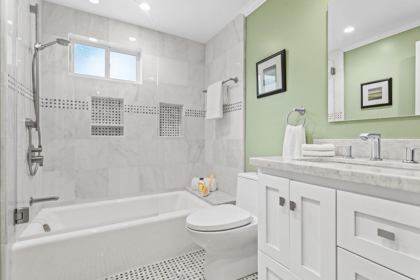 750 Edgewood Road San Mateo, CA 94402 - Photo 15 of 26 a bathroom with a sink a toilet and a bathtub