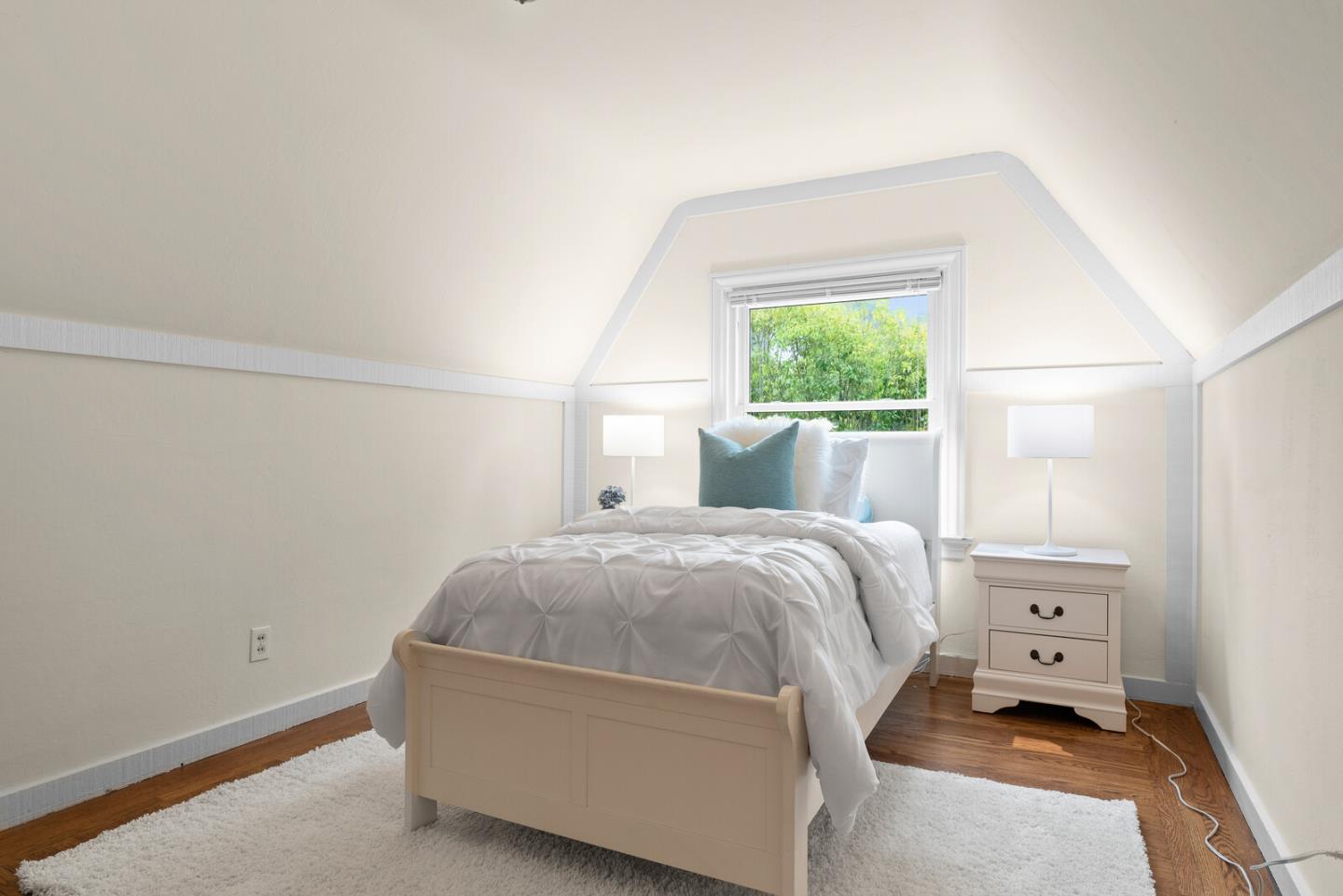 750 Edgewood Road San Mateo, CA 94402 - Photo 20 of 26 a bedroom with a bed and a window