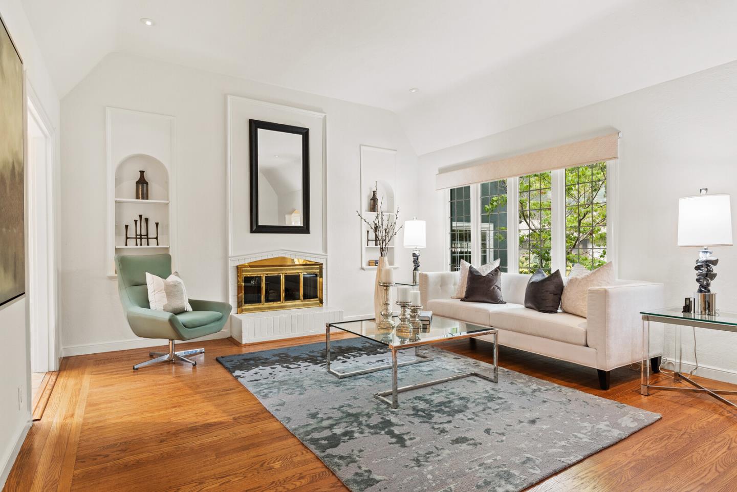 750 Edgewood Road San Mateo, CA 94402 - Photo 2 of 26 a living room with furniture and a rug