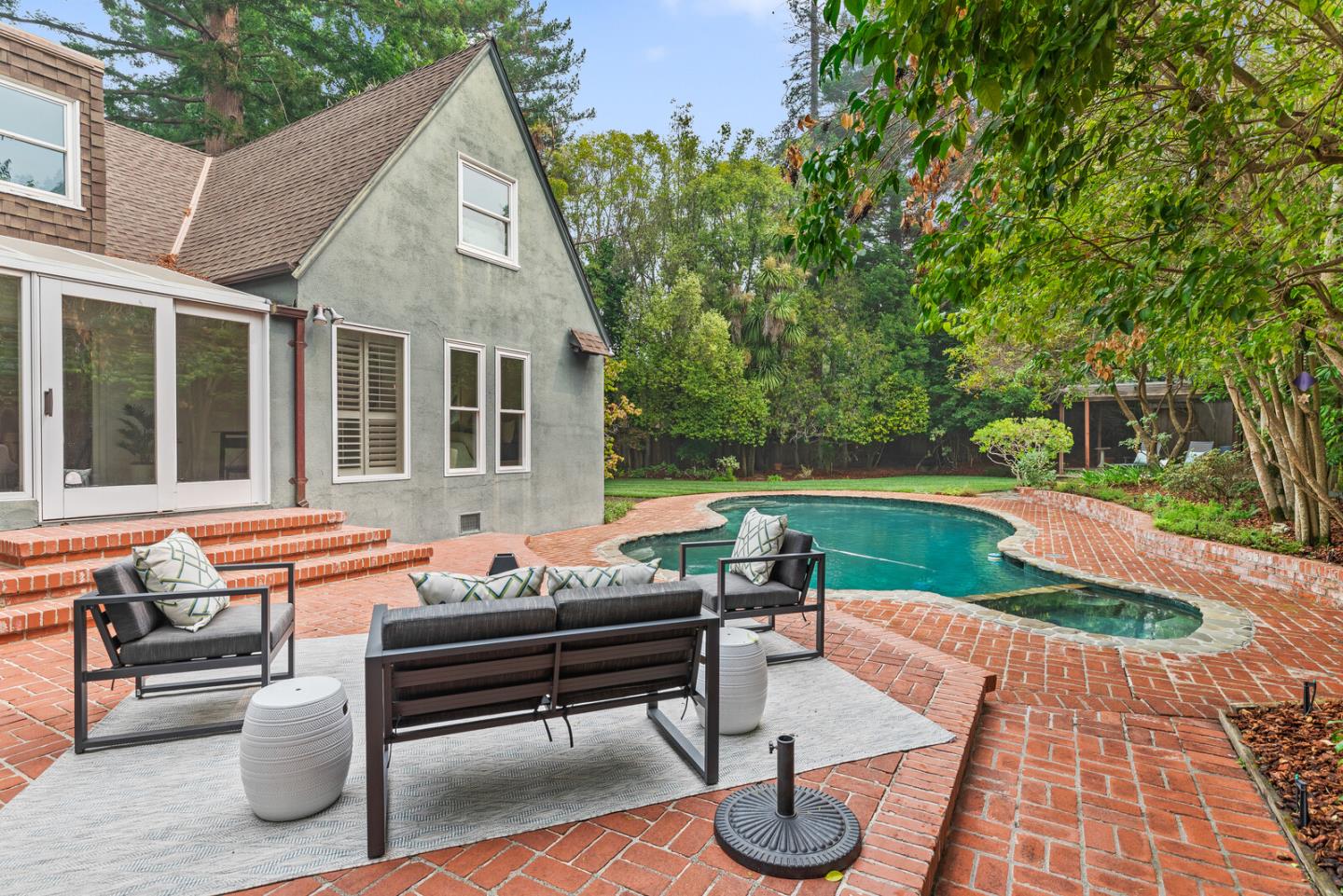 750 Edgewood Road San Mateo, CA 94402 - Photo 21 of 26 a backyard of a house with seating space