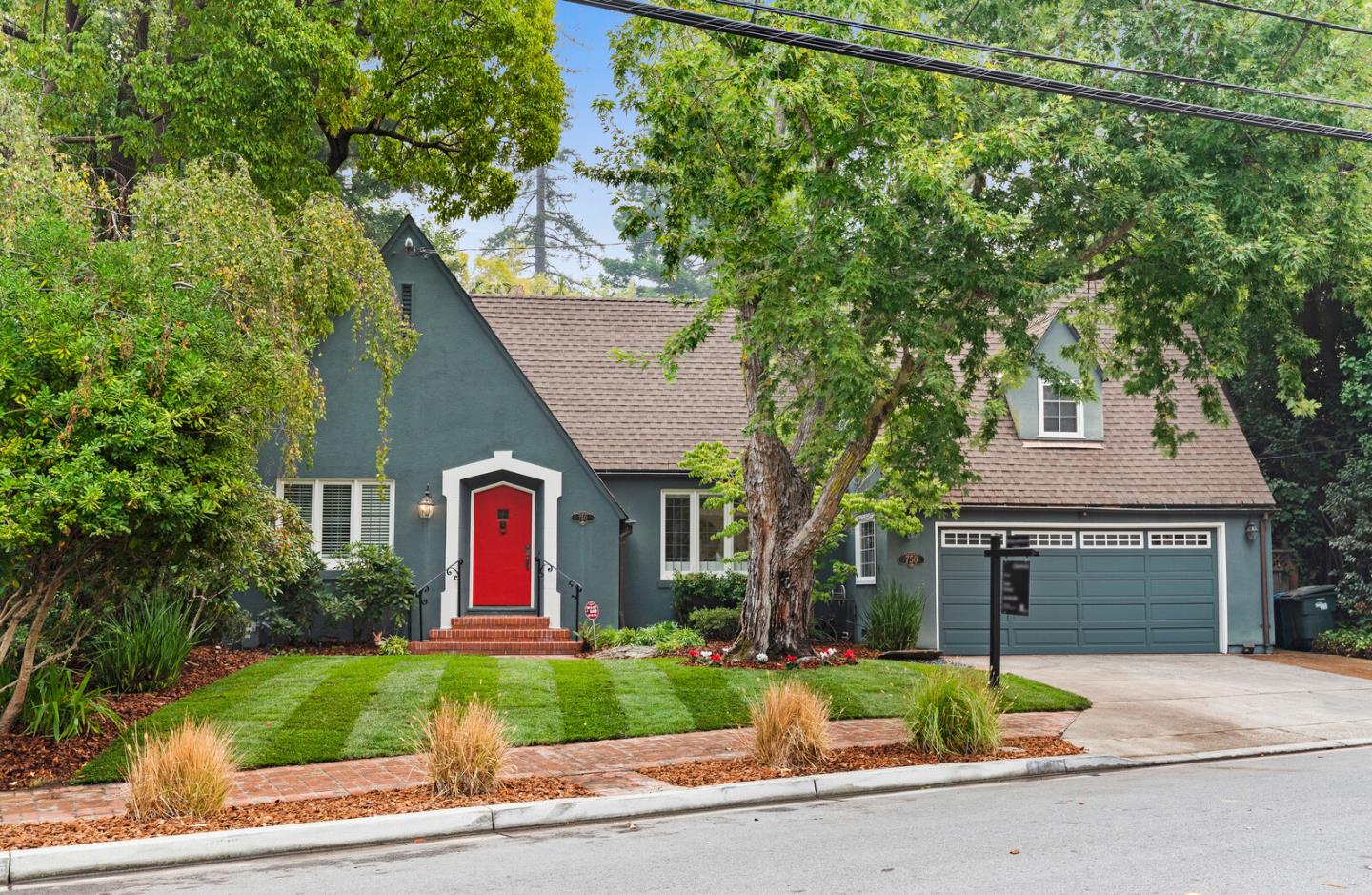 750 Edgewood Road San Mateo, CA 94402 - Photo 25 of 26 a front view of a house with yard and green space