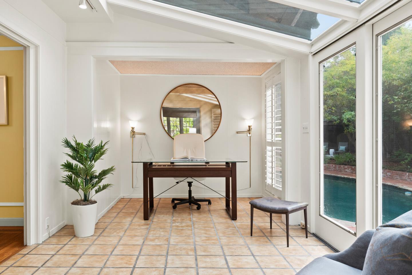 750 Edgewood Road San Mateo, CA 94402 - Photo 6 of 26 a living room filled with furniture