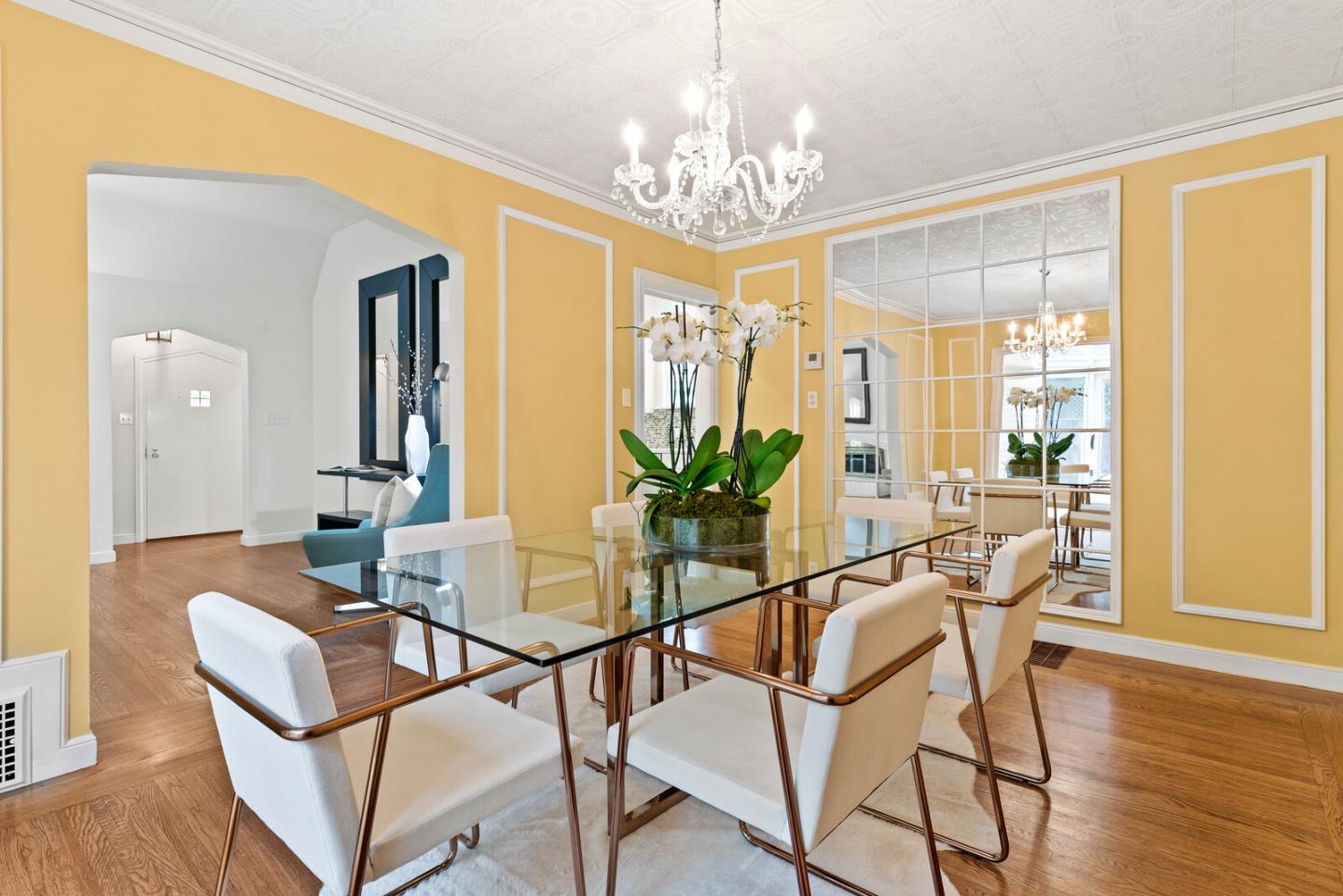 750 Edgewood Road San Mateo, CA 94402 - Photo 9 of 26 a dining room with furniture a chandelier and wooden floor