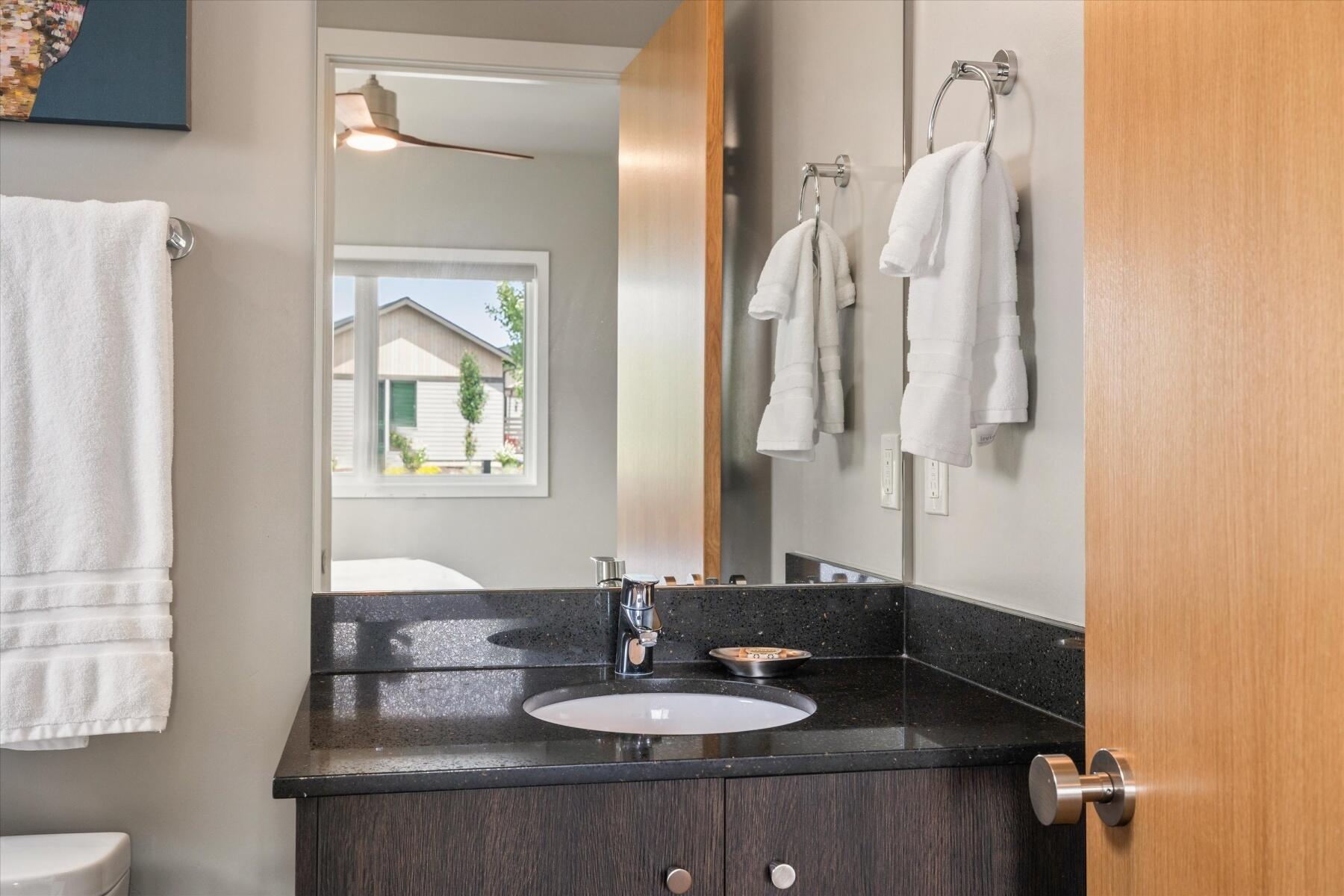 19208 Gateway Loop, Unit 17 Bend, OR 97702 - Photo 12 of 38 Every bedroom has it's own private bathroom. First class comfort for all your guests.