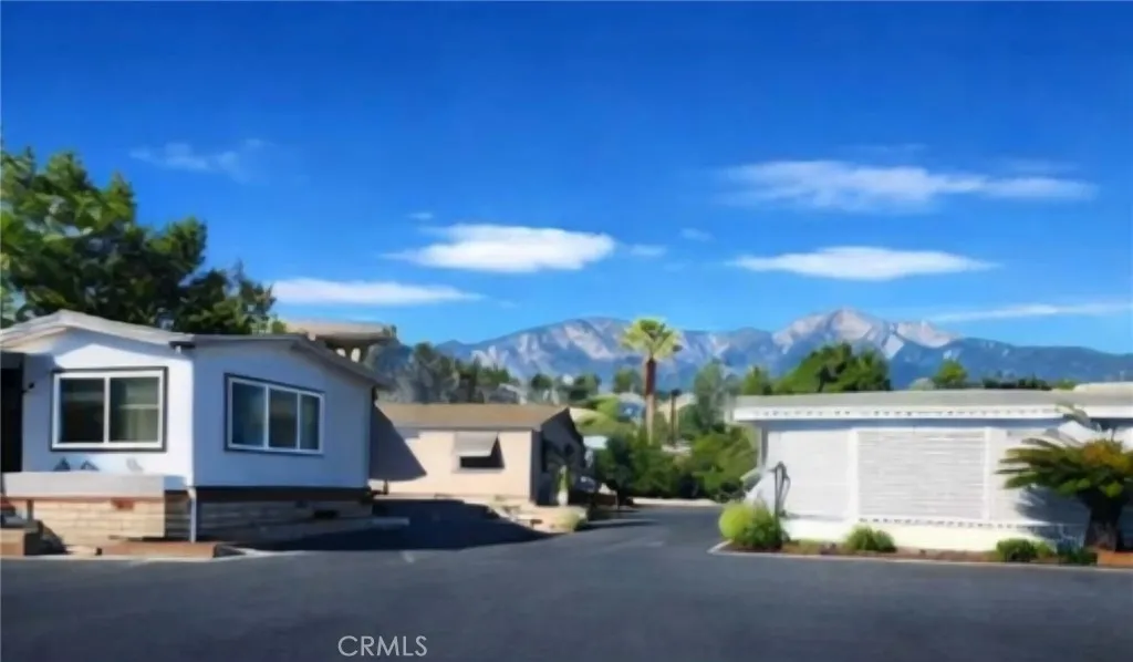 8651 Foothill, Unit 159 Rancho Cucamonga, CA 91730 - Photo 18 of 18 a view of a house with a patio