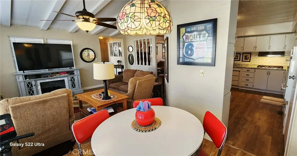 8651 Foothill, Unit 159 Rancho Cucamonga, CA 91730 - Photo 10 of 18 a living room with furniture and a flat screen tv