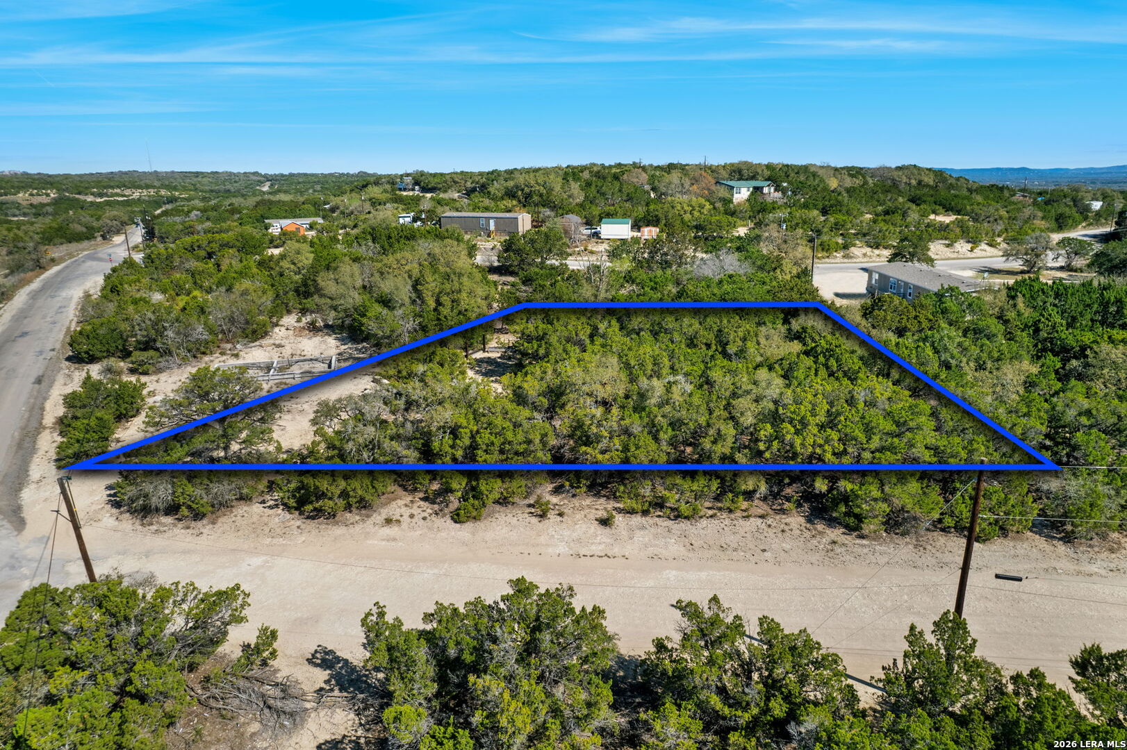 Tbd Bandera Lakeshore Bandera, TX 78003 - Photo 4 of 8 a view of a street